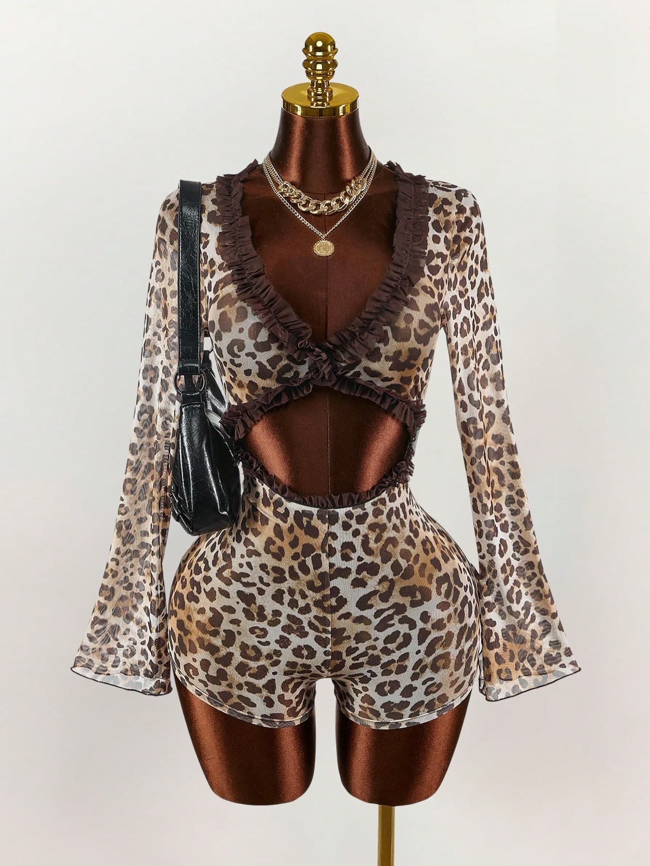 European And American New Slim Sexy Hot Lace Lace Stitching Leopard Print Mesh Hollow Out Jumpsuit